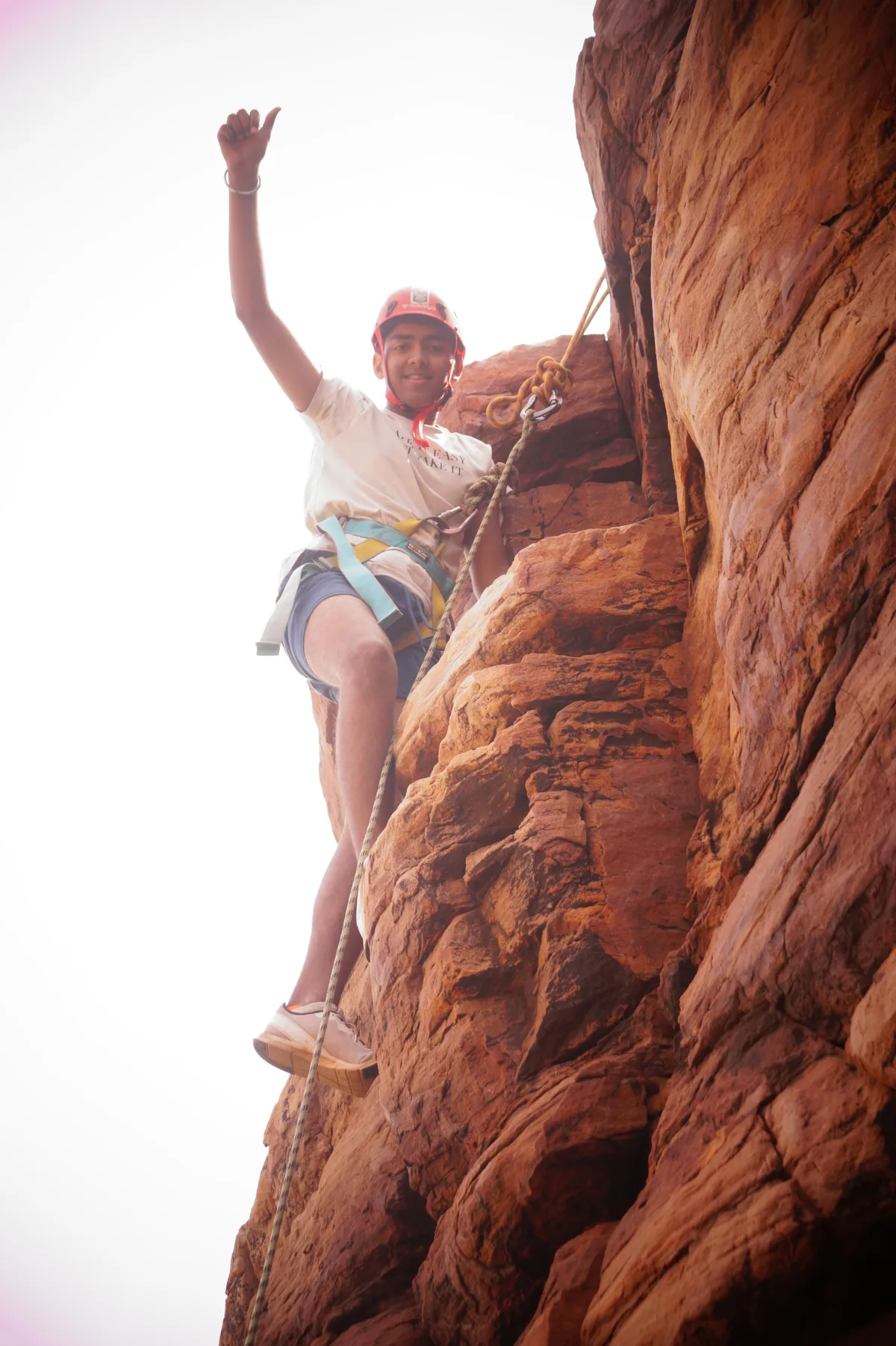 A Senior Secondary student rock climbing during the Gandikota expedition